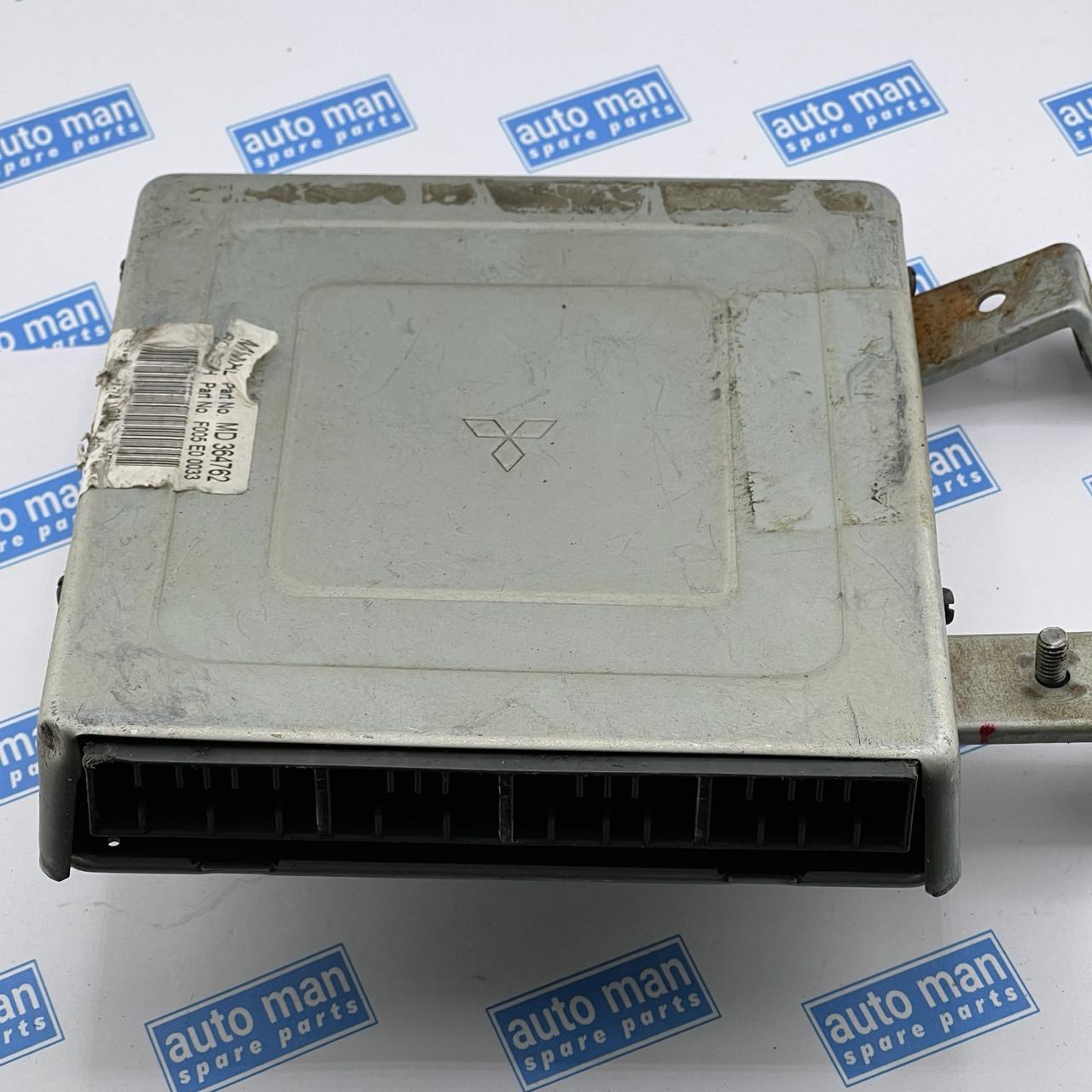 Mitsubishi -F005E00033 ECM ENGINE COMPUTER module F005 E0 0033   MD364762