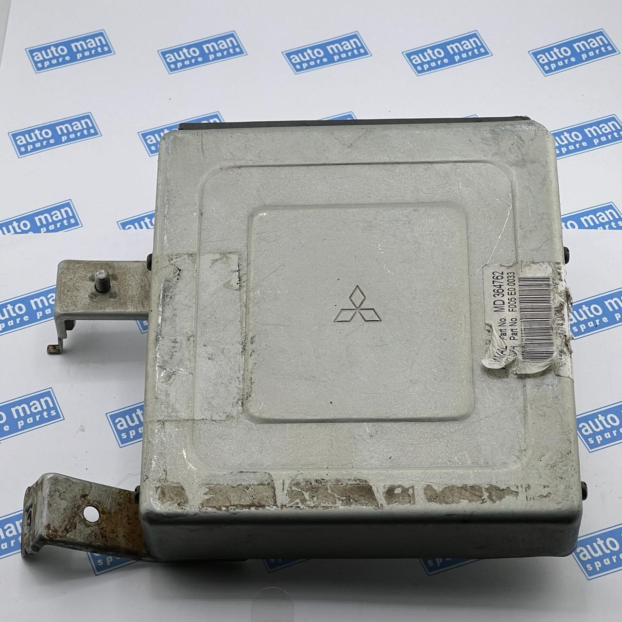 Mitsubishi -F005E00033 ECM ENGINE COMPUTER module F005 E0 0033   MD364762